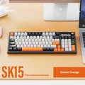 SK15 wired mechanical gaming keyboard with adjustable control knob in sunset orange colour