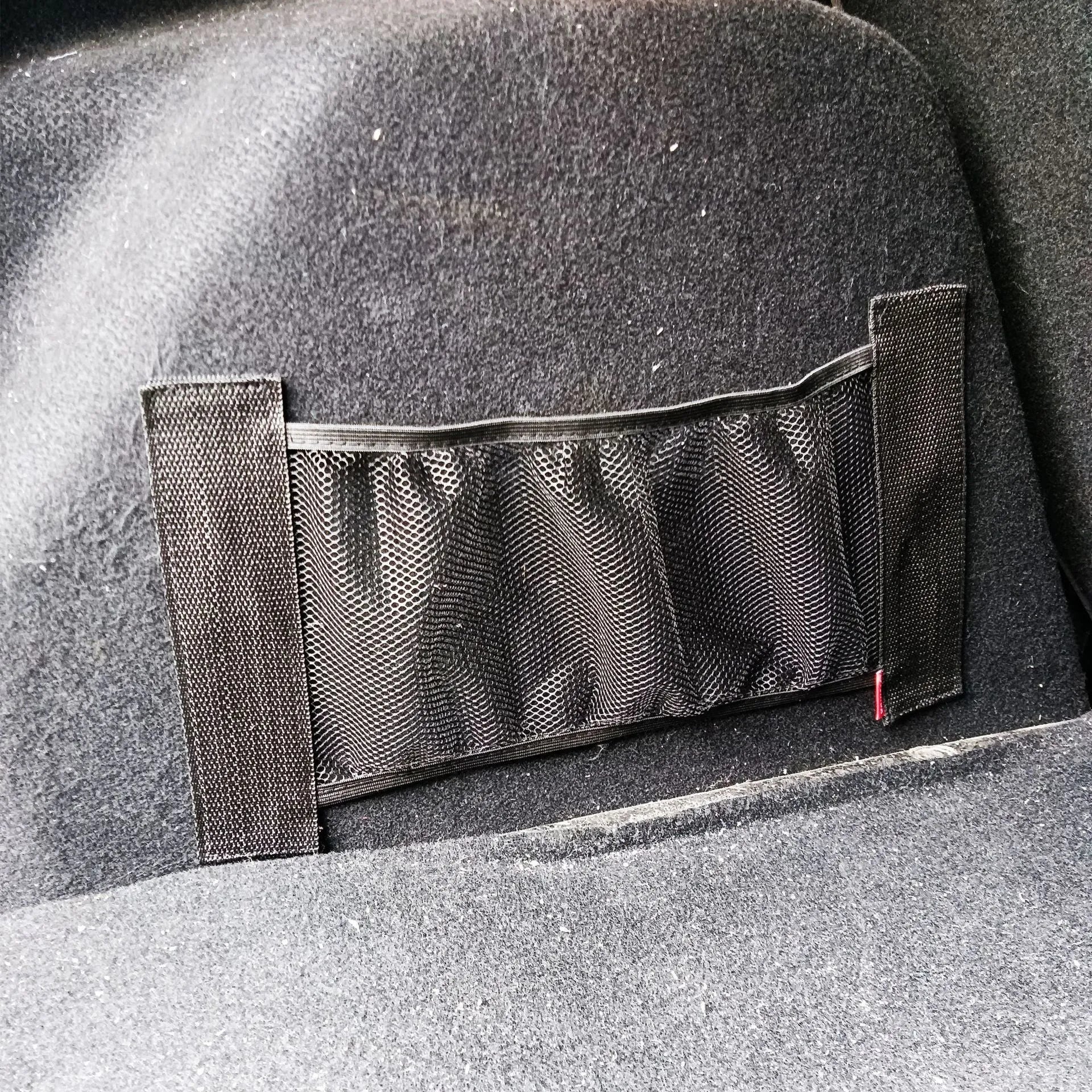 Polyester elastic storage net for car boot organisation in 20x35cm or 20x45cm size.