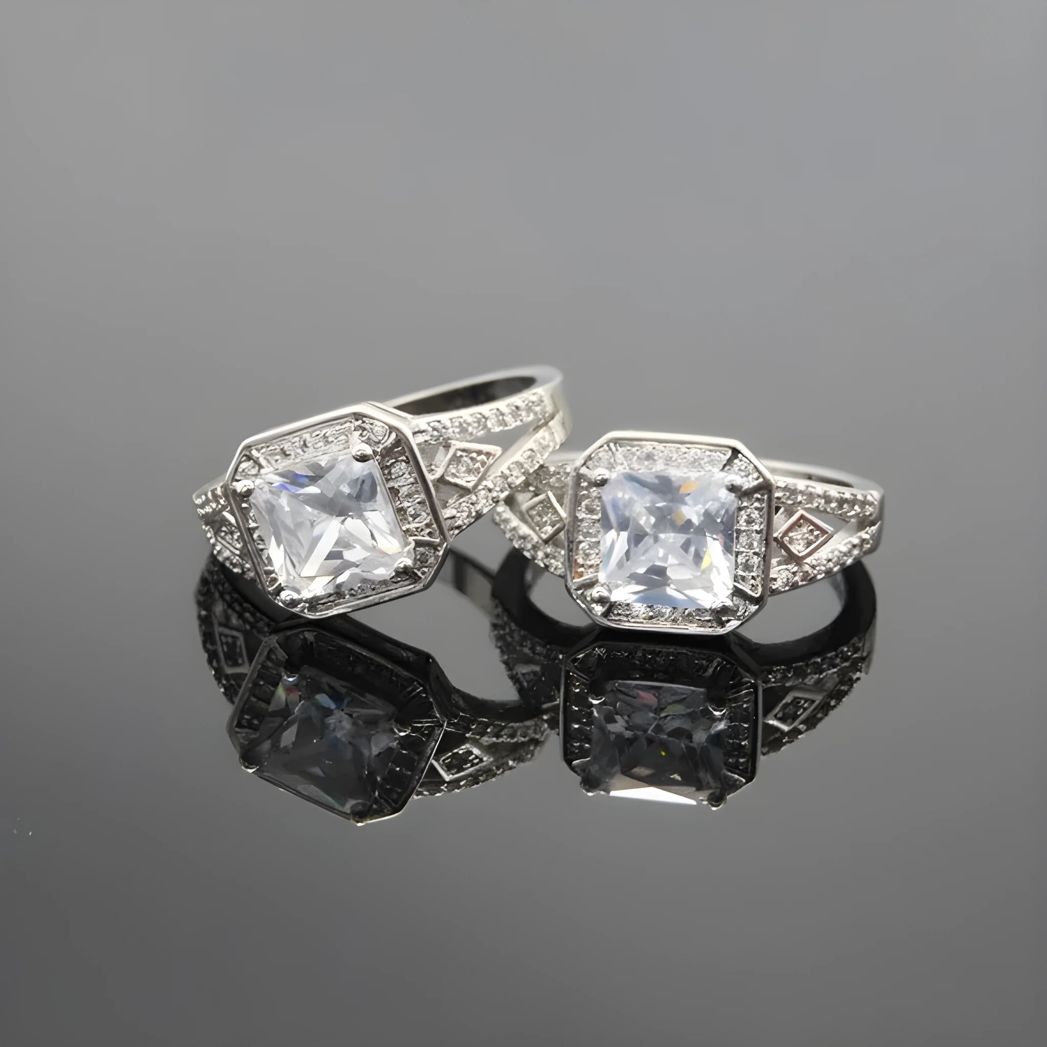 Women's geometric zircon ring with hollow design and quadrilateral shape in platinum colour.