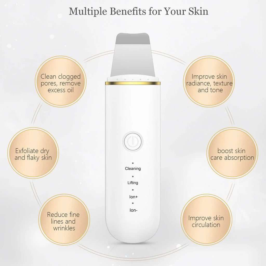 Pore cleansing facial device in golden finish with metal head, resting on a surface with USB cable