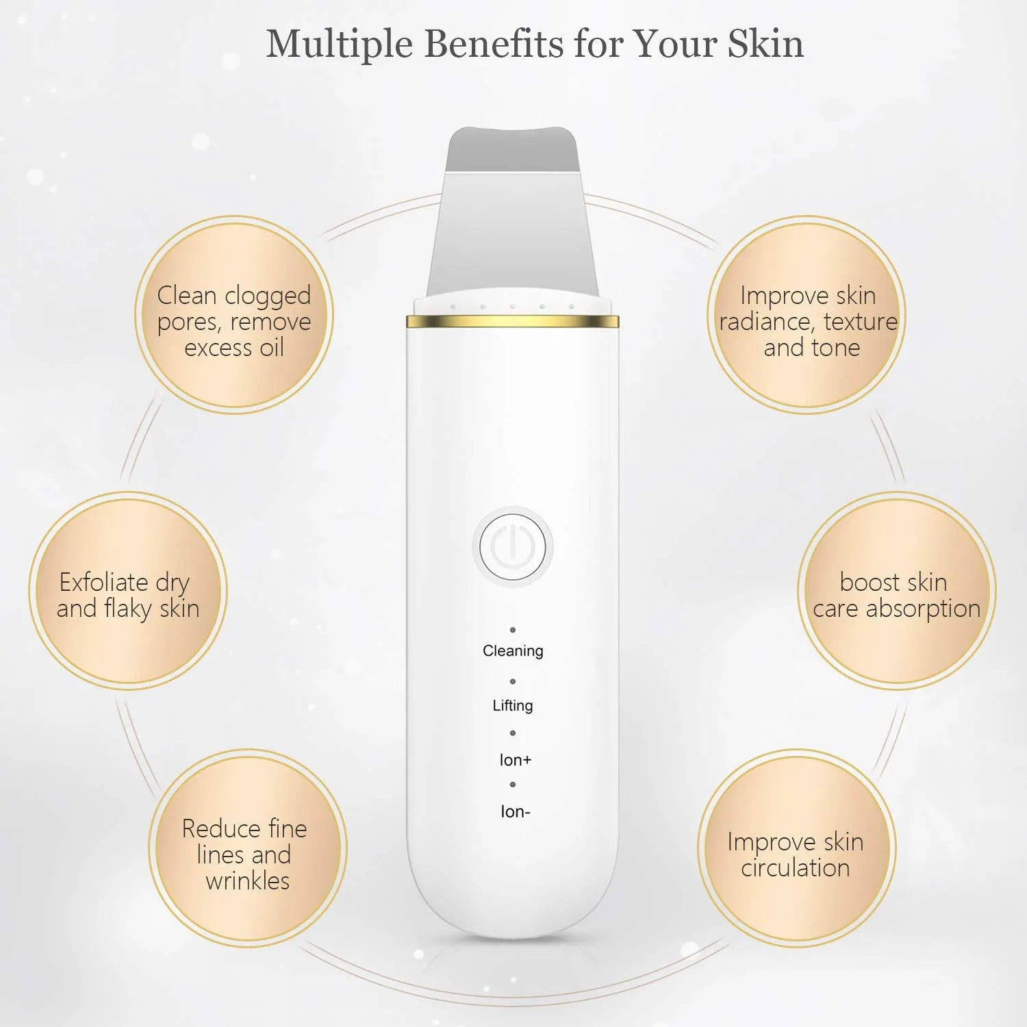 Pore cleansing facial device in golden finish with metal head, resting on a surface with USB cable