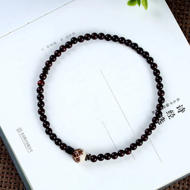 Natural rosewood bracelet with knitted texture and 10mm floral centrepiece in unisex retro design