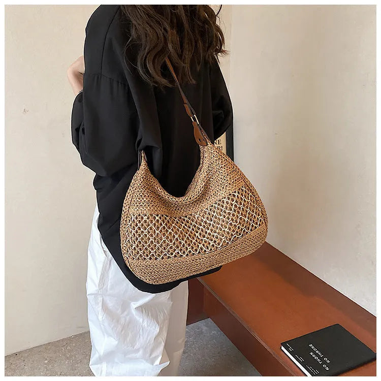 Women's straw cross body bag in horizontal square design with sandwich pocket