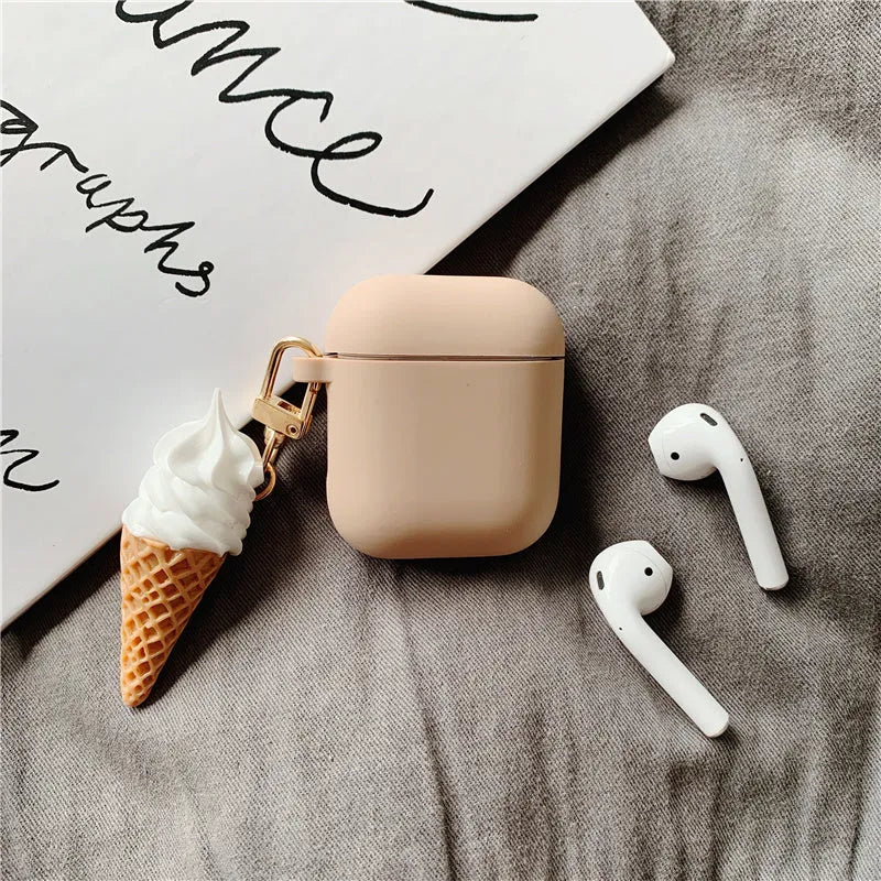 Silicone case for Apple AirPods 2 with cylindrical ice cream swirl design showing charging port cutout