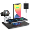 Black wireless desktop charging station with phone charging pad, watch USB port, and headphone charging port