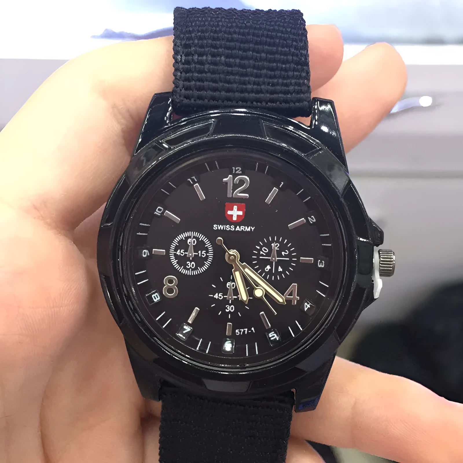 Cloth belt weaving military watch with quartz movement 40.5mm round dial and textile strap on display