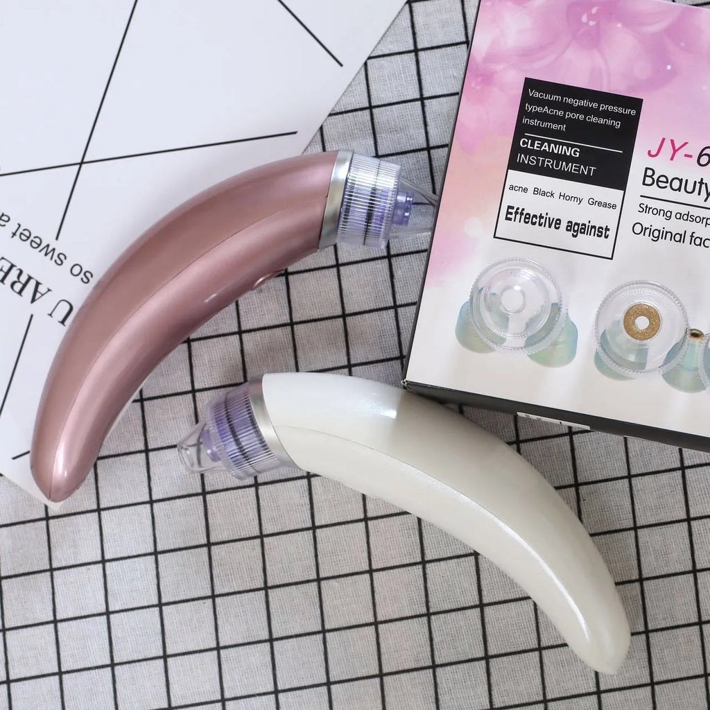 Rose gold and white electric blackhead suction instrument for facial pore cleaning
