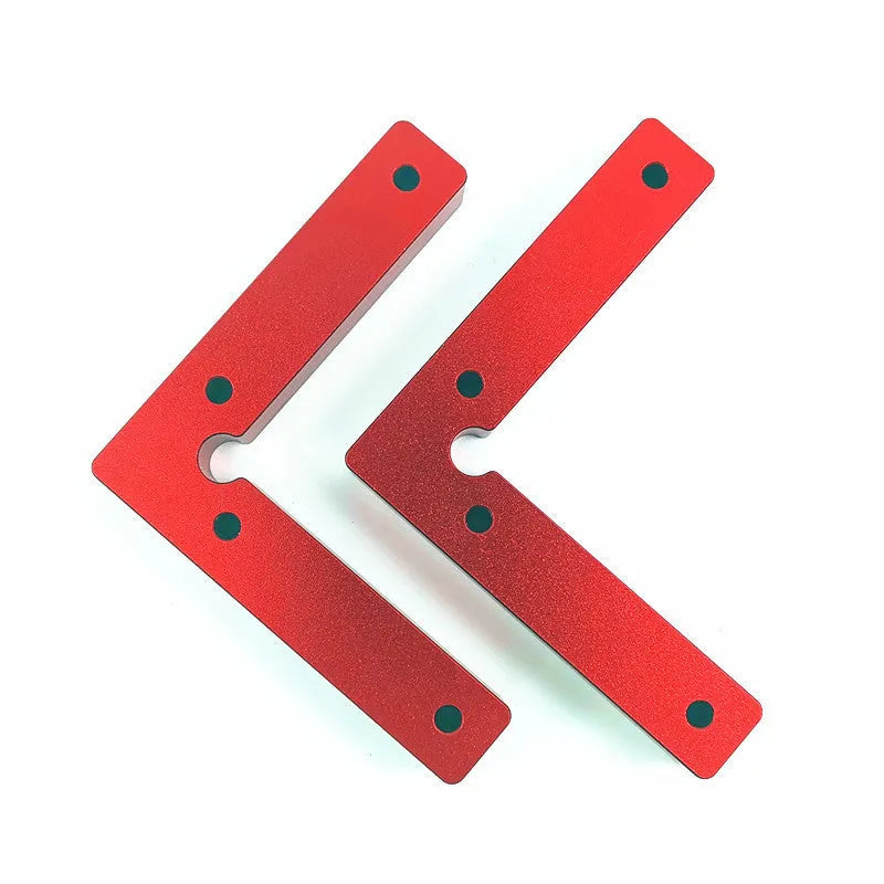 Aluminium right angle positioning block for woodworking jigsaw on a workbench.