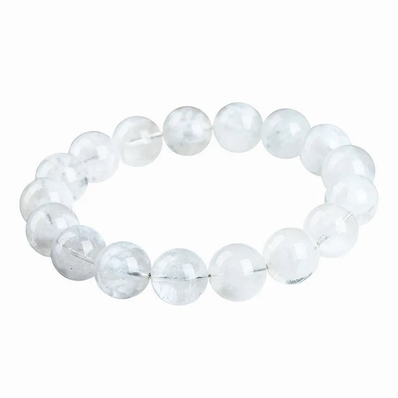 Women's crystal bracelet with natural blizzard snowflake round beads and traditional charm elements