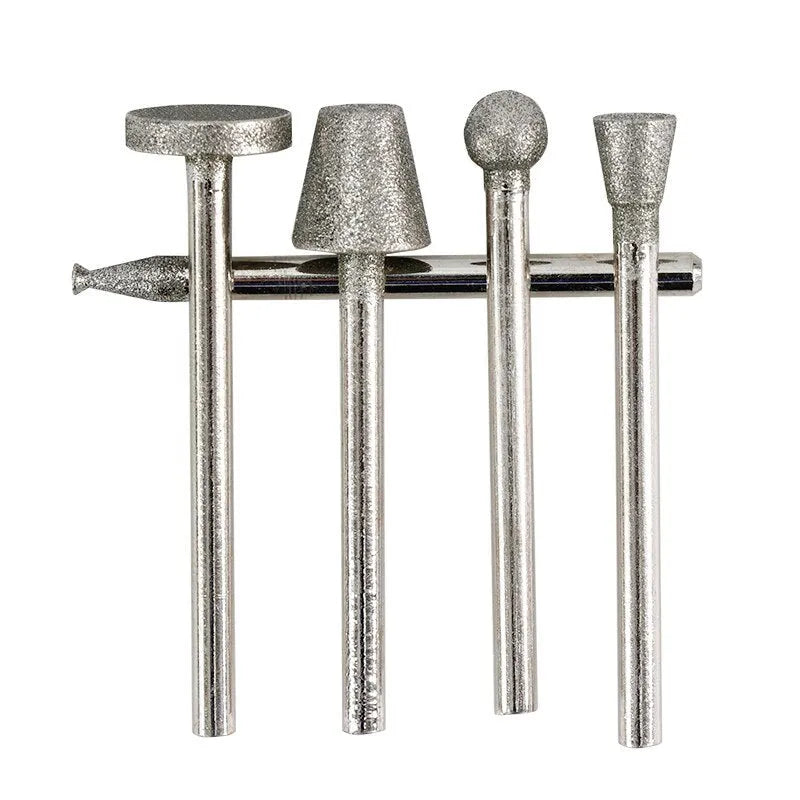 Golden diamond alloy grinding head with 3mm shank and elliptical cone shape for stone carving