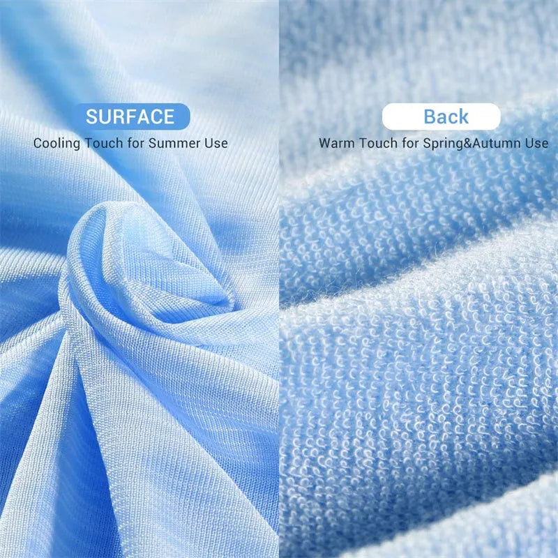 Blue and grey polyester cooling blanket with Japanese Q-Max fibres on a bed.