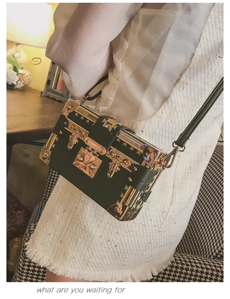 Hard-shell women's shoulder bag in PU leather with flap closure and adjustable single strap