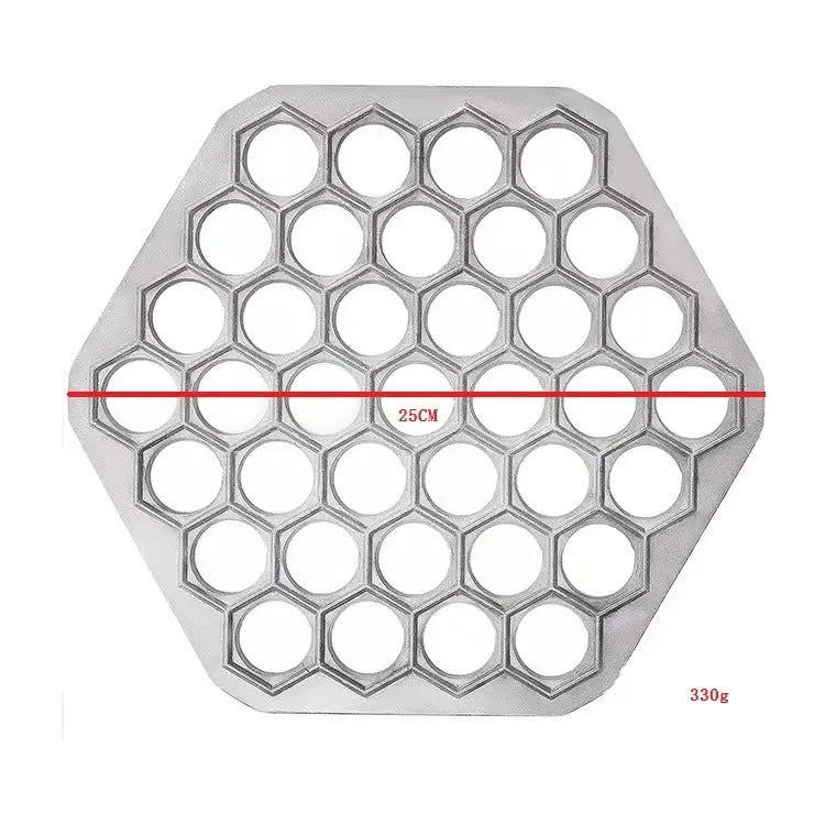 Silver aluminum alloy 37-hole dumpling mold on a plain background