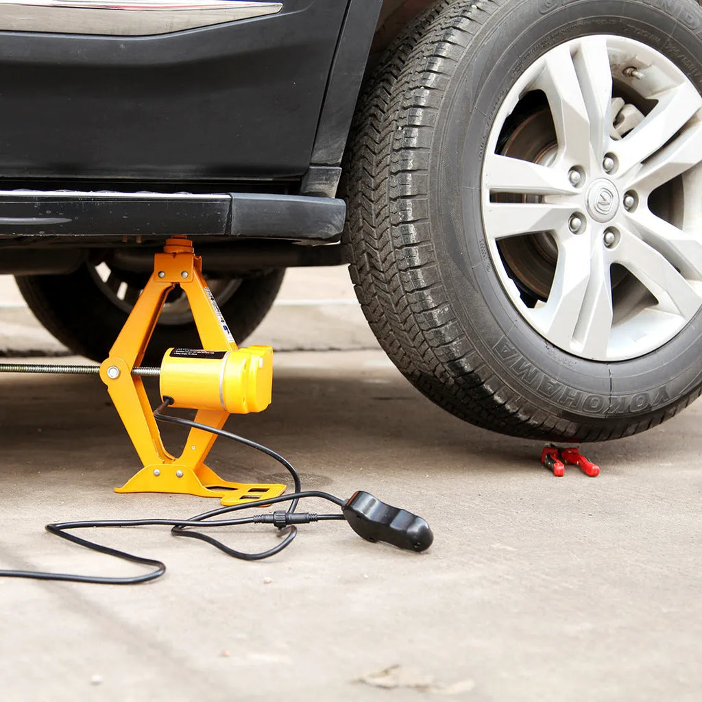 Electric hydraulic vehicle jack kit with 2-tonne capacity on a grey background