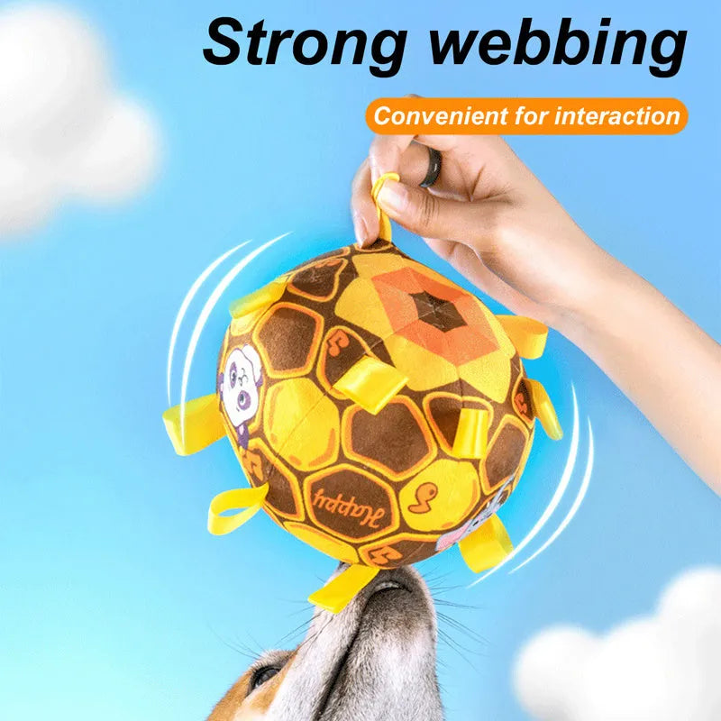 Green interactive ball dog toy with plush handle and built-in bell for aggressive chewers