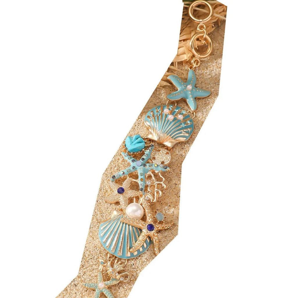 Women's alloy bracelet with boat anchor and starfish design in turquoise, red, or blue.