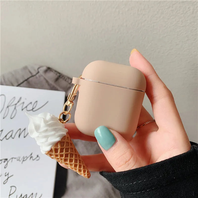 Silicone case for Apple AirPods 2 with cylindrical ice cream swirl design showing charging port cutout
