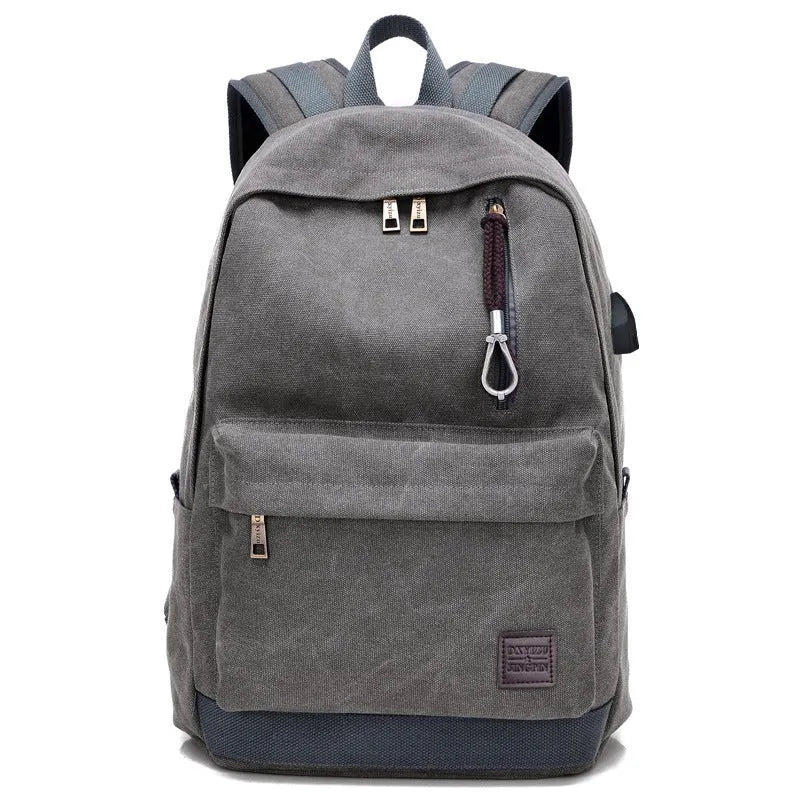 Coffee coloured canvas backpack with USB charging port and multiple zippered compartments