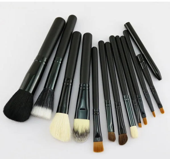 Niya Supply 12-piece makeup brush set in black PU cylinder with assorted wooden-handled brushes