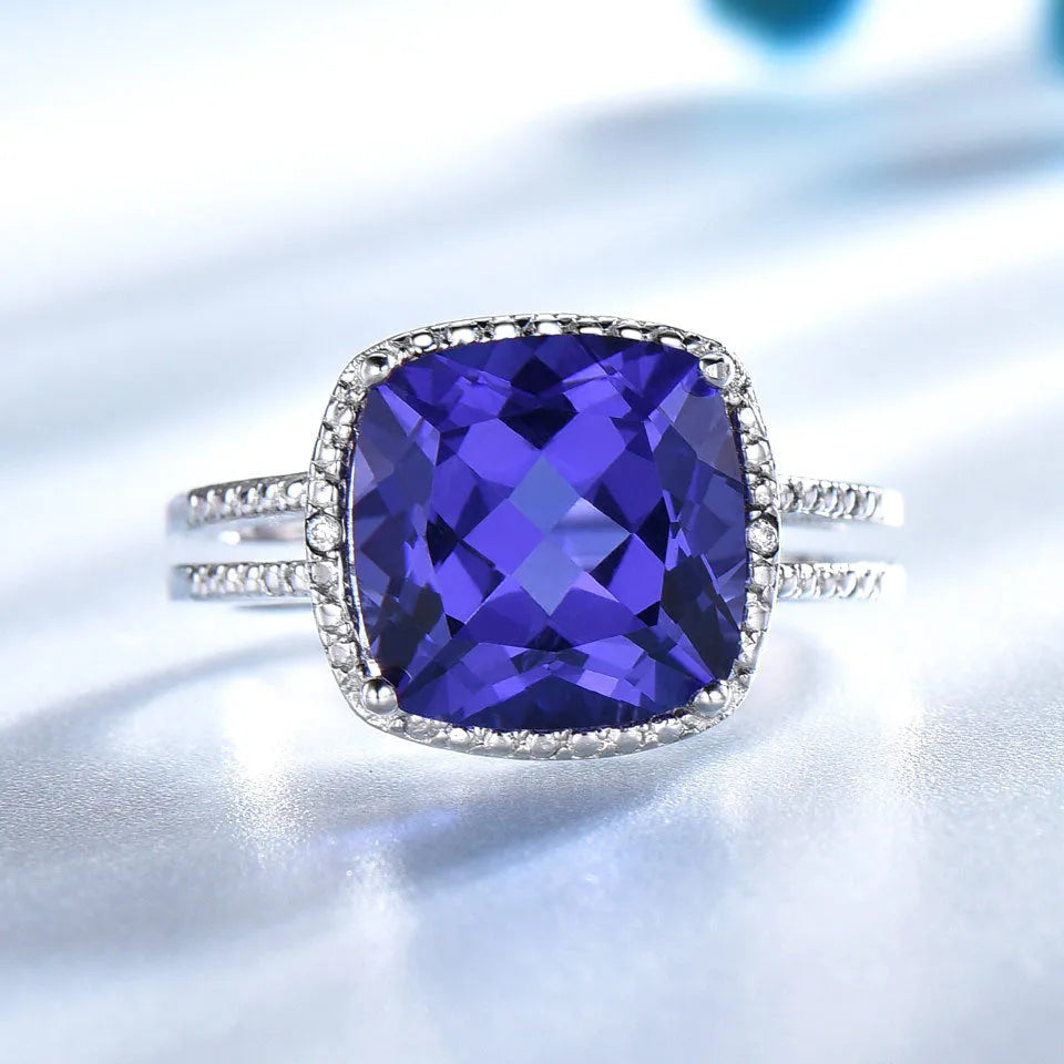 Women's sterling silver ring with blue tanzanite stone showing band detail