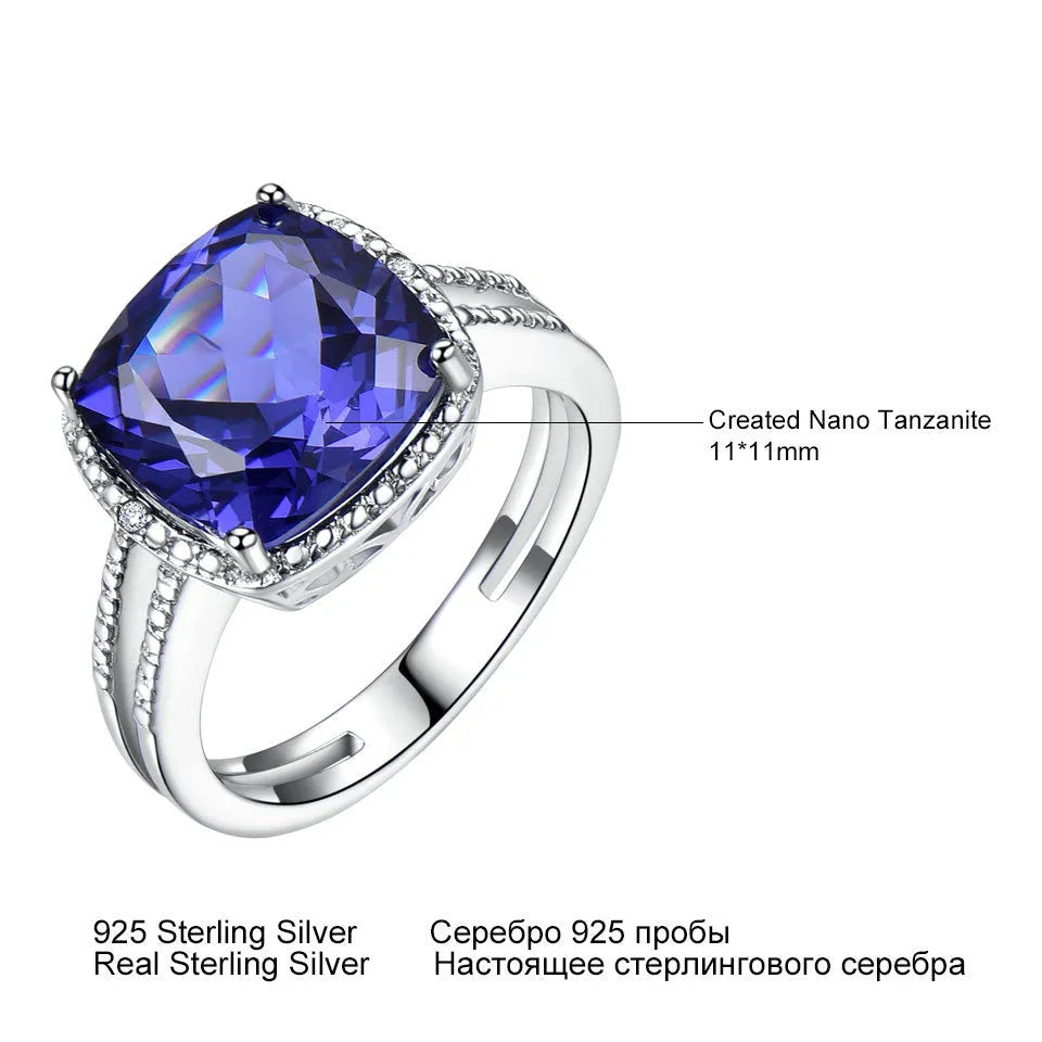 Women's sterling silver ring with blue tanzanite stone showing band detail