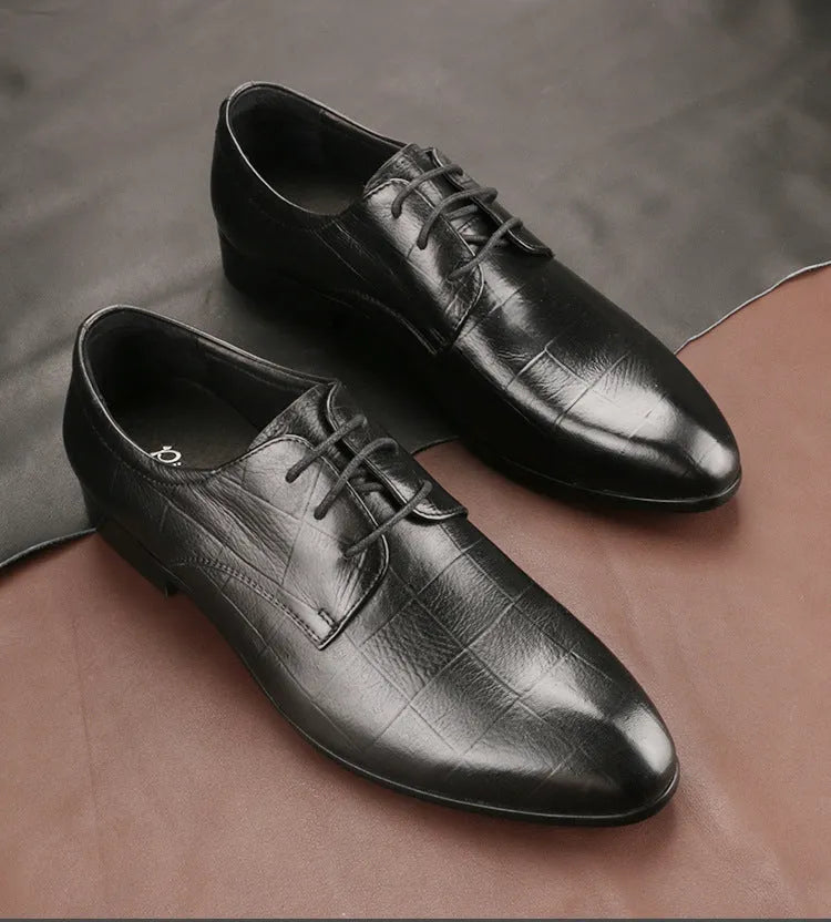 Men's black leather derby shoes with a pointed toe cap and anti-skid rubber sole.