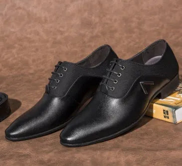 Men's black Oxford shoes with a low-cut PU upper and rubber sole on a white background.