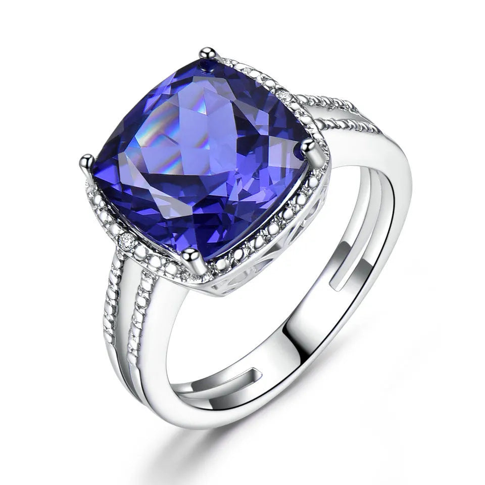 Women's sterling silver ring with blue tanzanite stone showing band detail