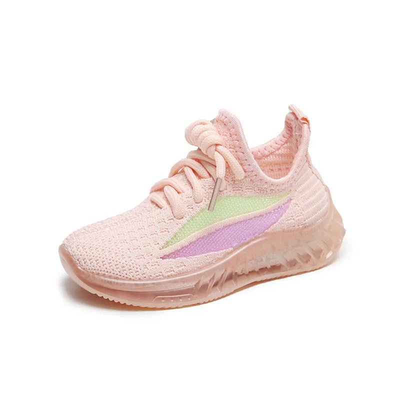 Children's white woven mesh sports shoes with rubber sole, side view on light background