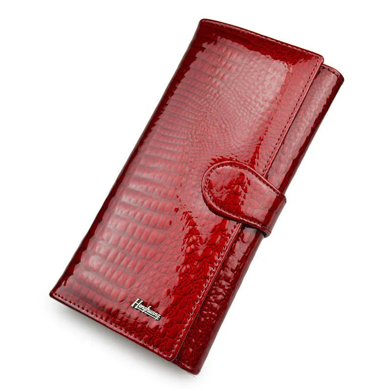 Women's red crocodile pattern leather coin purse with patent finish and pigskin lining interior
