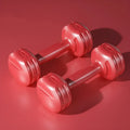 Pair of Longway China Red PE dumbbells on a light background, available in 1 to 5 kg weights