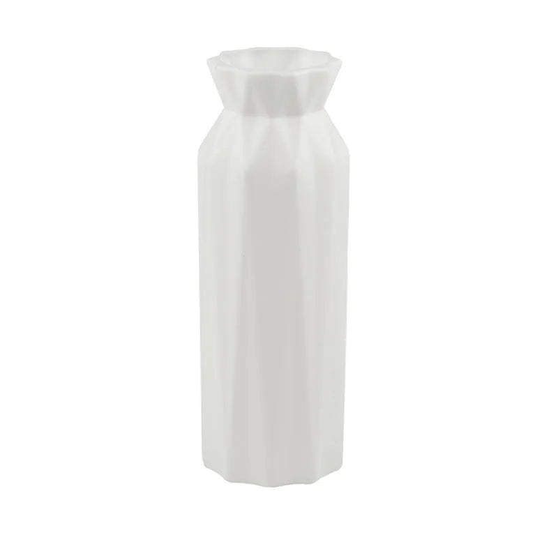 Green melamine drop-resistant vase with a wide base on a wooden table