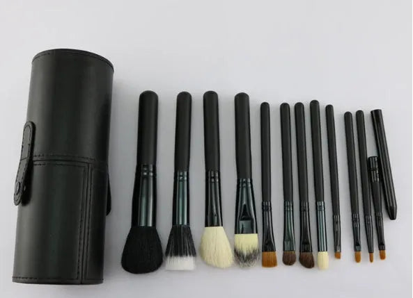 Niya Supply 12-piece makeup brush set in black PU cylinder with assorted wooden-handled brushes