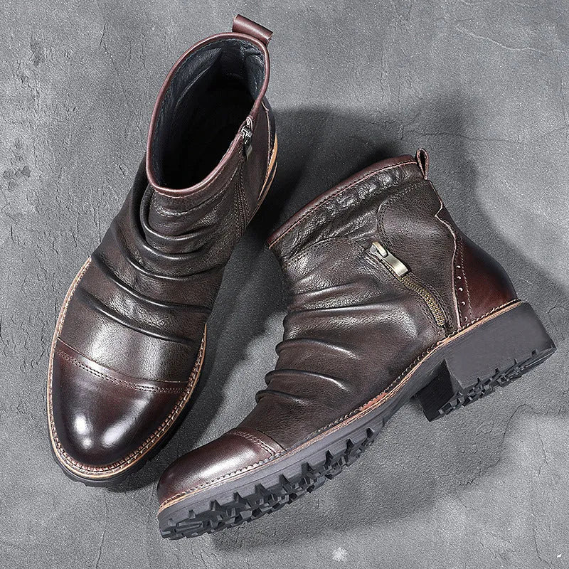 Men's black side zip cowboy boots with a round toe and mid-height horseshoe heel on a white background.