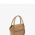 Genuine cow leather wing-shaped tote bag with buckle detail and cross-body shoulder strap