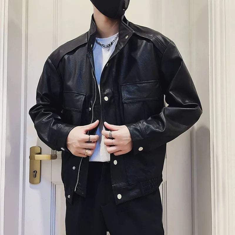 Men's black PU leather pilot jacket with a straight hem and side pocket, laid flat.