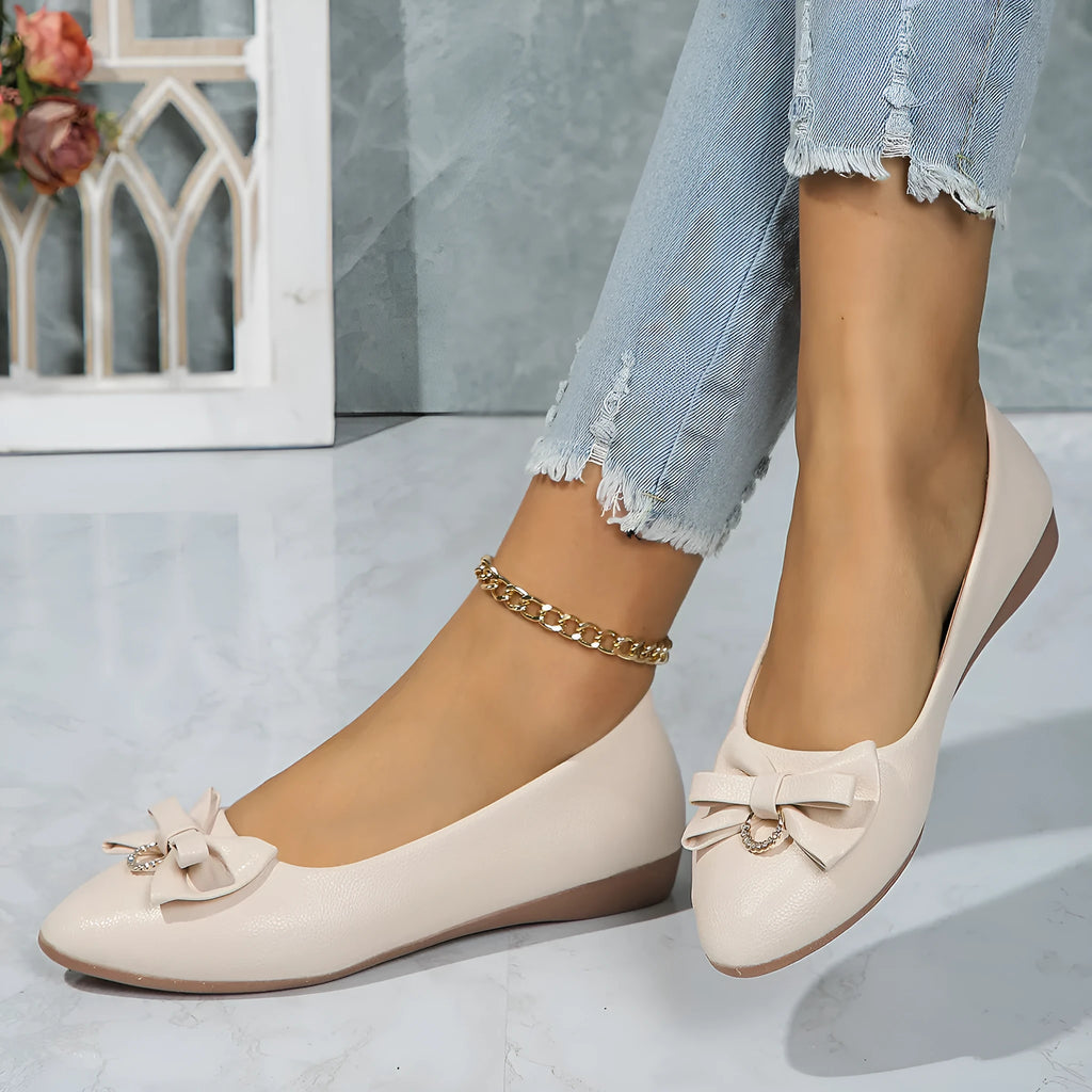 Women's beige flat casual slip-on loafers with a bow knot and shallow mouth design.
