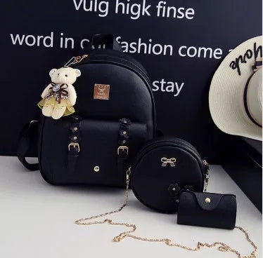 Women's three-piece PU leather backpack set showing backpack, crossbody shoulder bag, and card wallet in matching colour