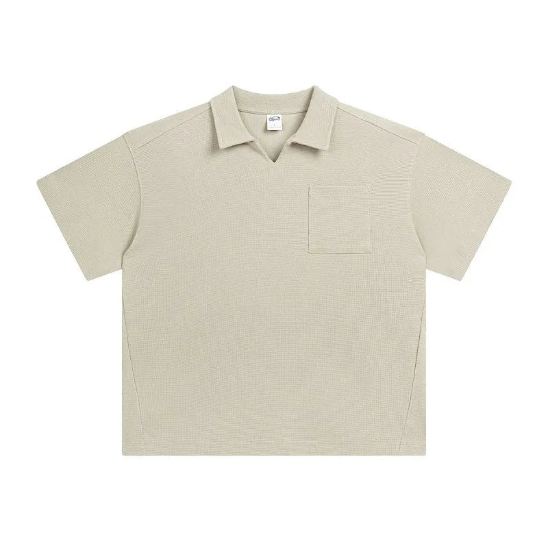 Cotton loose-fit drop-shoulder short sleeve top in Paris forest green, front view, with simple lapel neckline