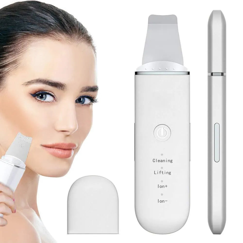 Pore cleansing facial device in golden finish with metal head, resting on a surface with USB cable