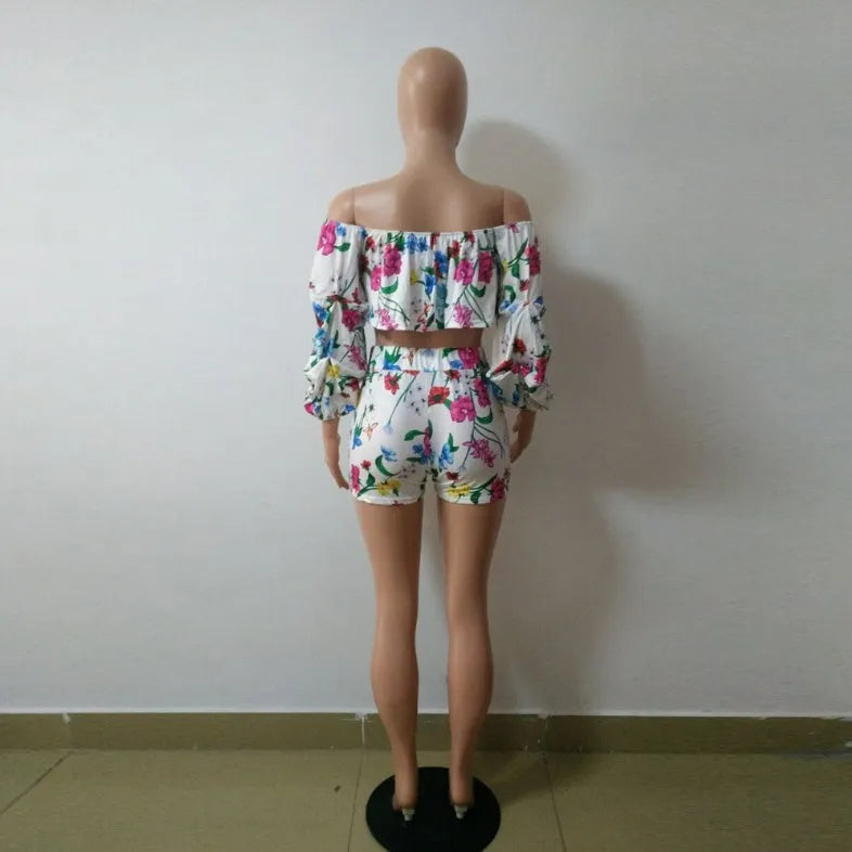 Women's multicolour digital print two-piece set with textured pile sleeves on the top and matching shorts.
