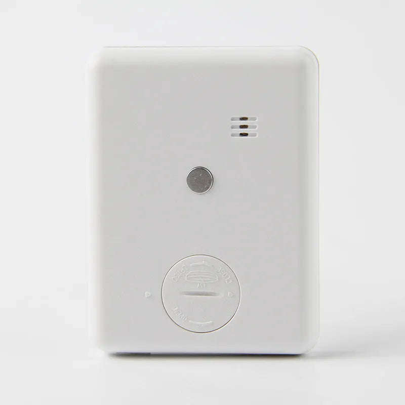Digital kitchen timer with magnetic back in black and white colour options showing countdown display
