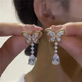 Bow stud earrings with electroplated platinum finish on zinc alloy