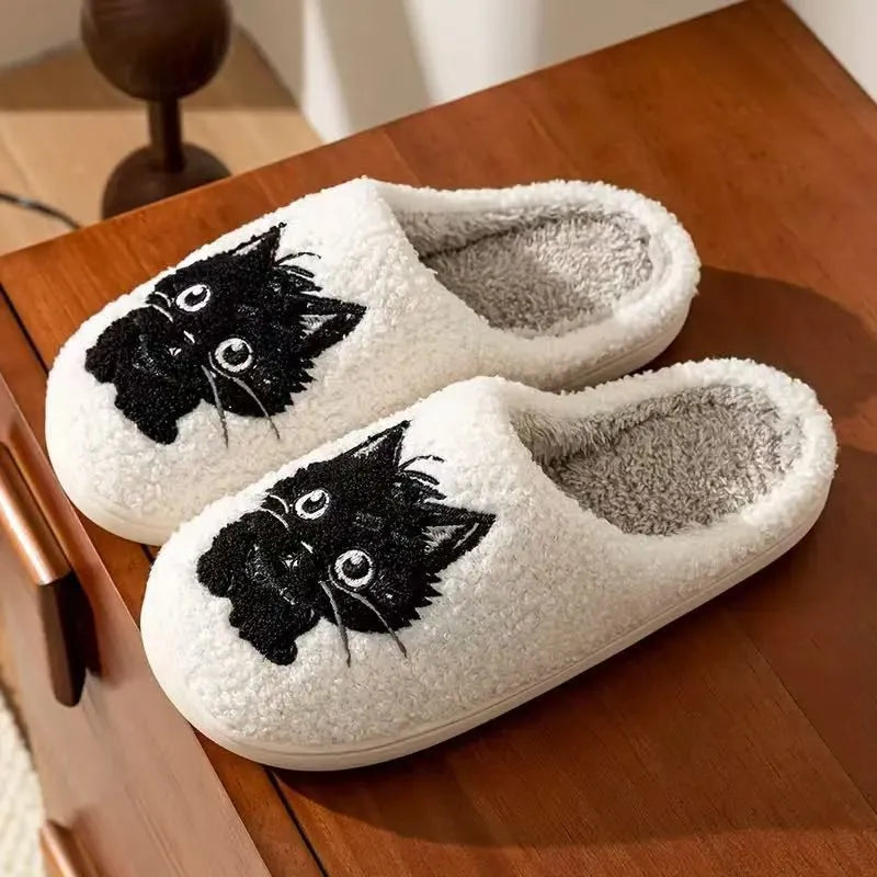 White cartoon Black Beard Cat couple slippers with plush fabric and a non-slip sole.