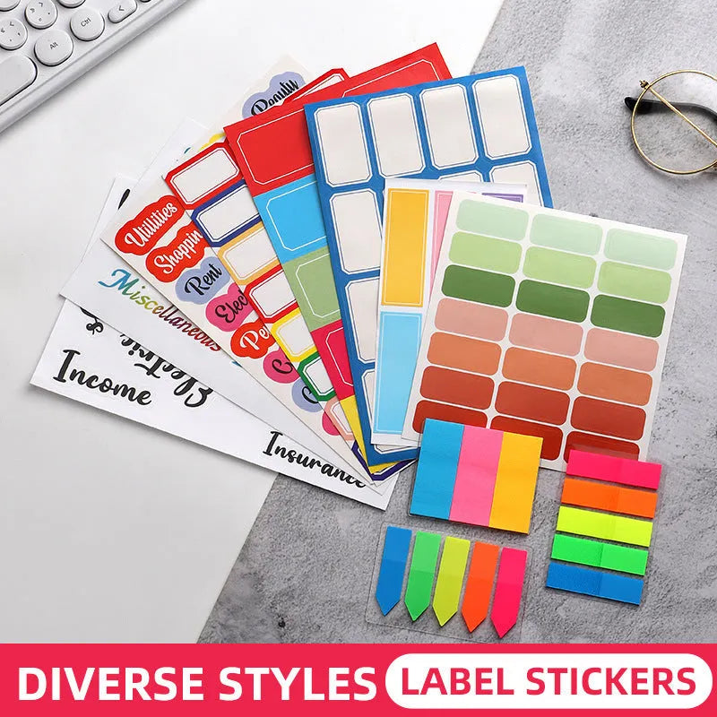 Assortment of paper adhesive stickers, labels, A6 rulers, and sticky notes in various colours and grid layouts.
