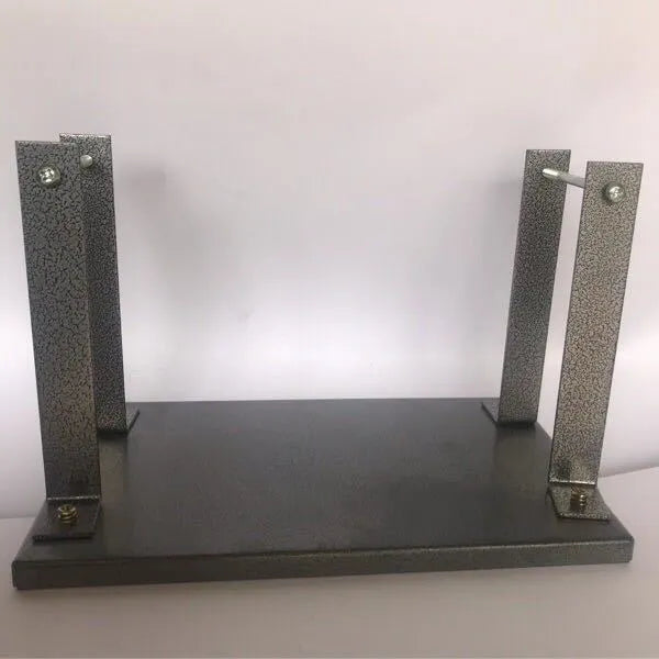 Black iron flip chip mounting bracket accessory for a portable electric planer.
