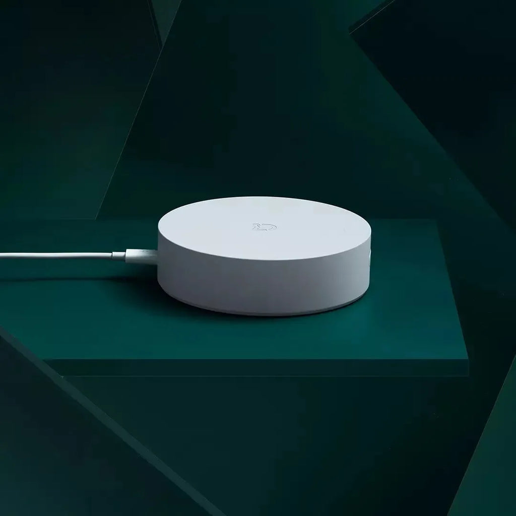 White Xiaomijia circular smart home gateway with UK plug for wall mounting