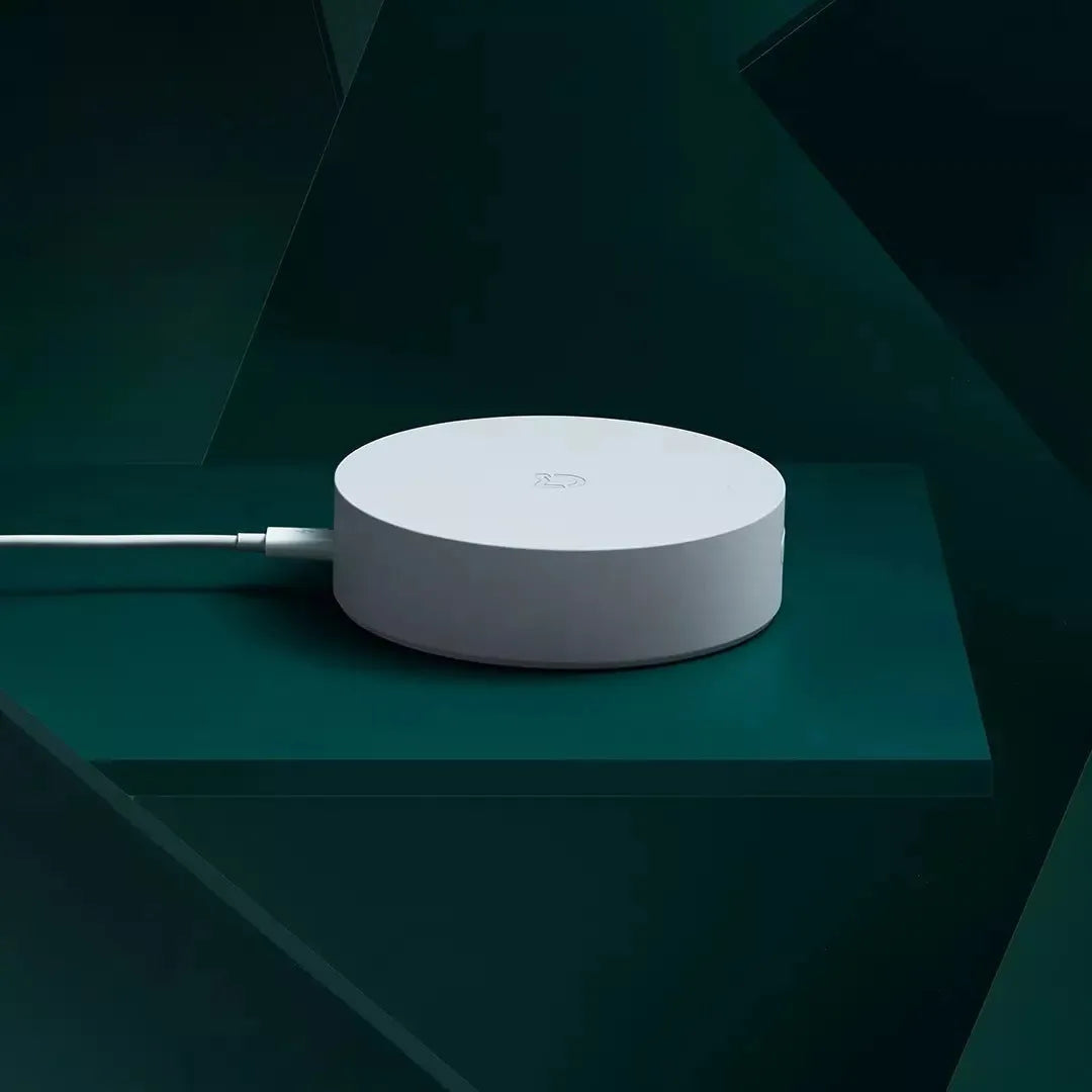 White Xiaomijia circular smart home gateway with UK plug for wall mounting