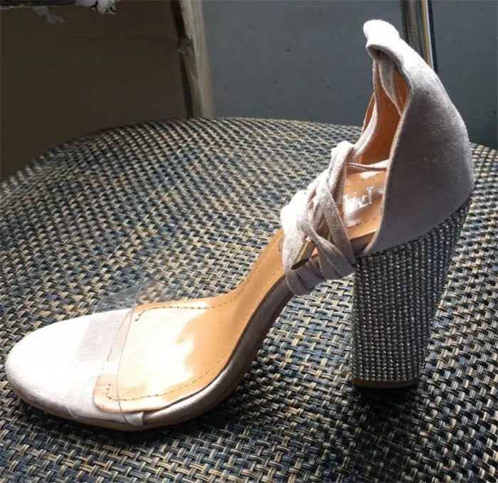 Pointed toe high heel shoes in black or gold colour with plastic construction