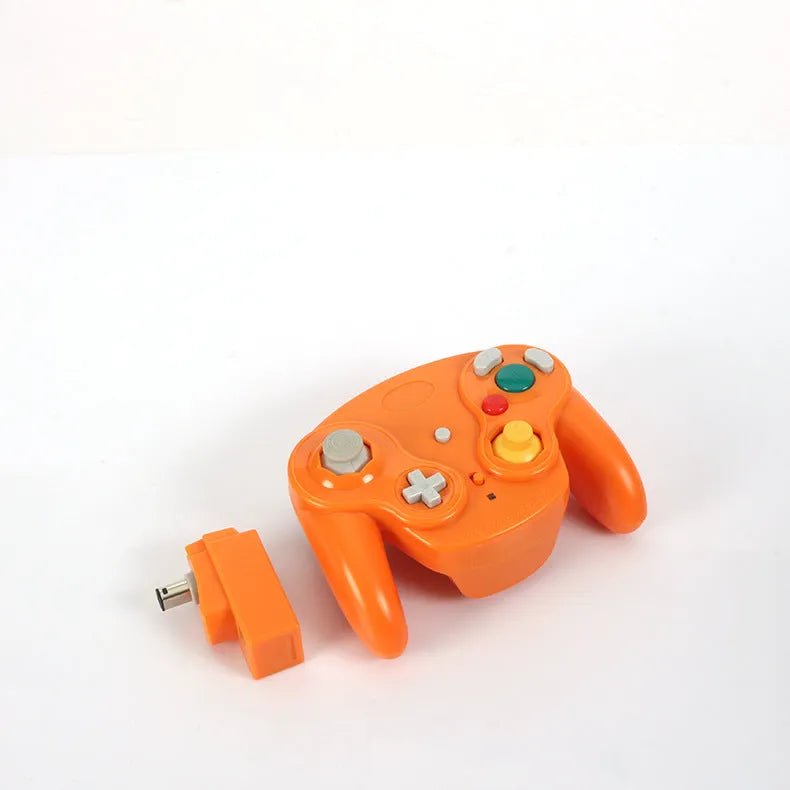 Wireless game controller for Wii and NGC consoles in various colours on a neutral background